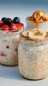 A bowl of high-protein overnight oats topped with fresh fruits and nuts.