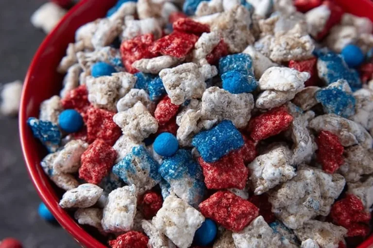 Festive Red White & Blue Puppy Chow dessert mix with patriotic colors